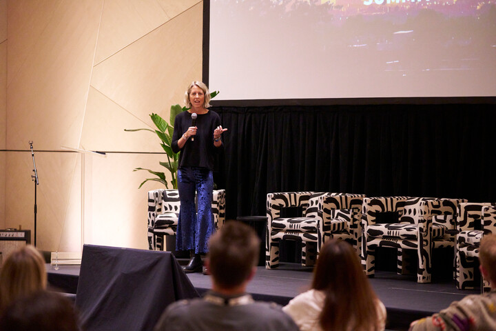 kate williams speaking at global summit 2023 on stage